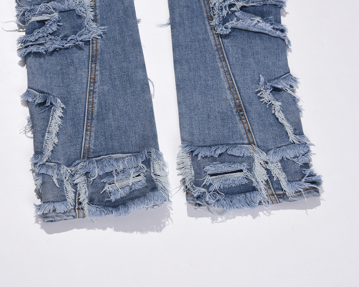 Ripped Patch Whisker Blue Jeans