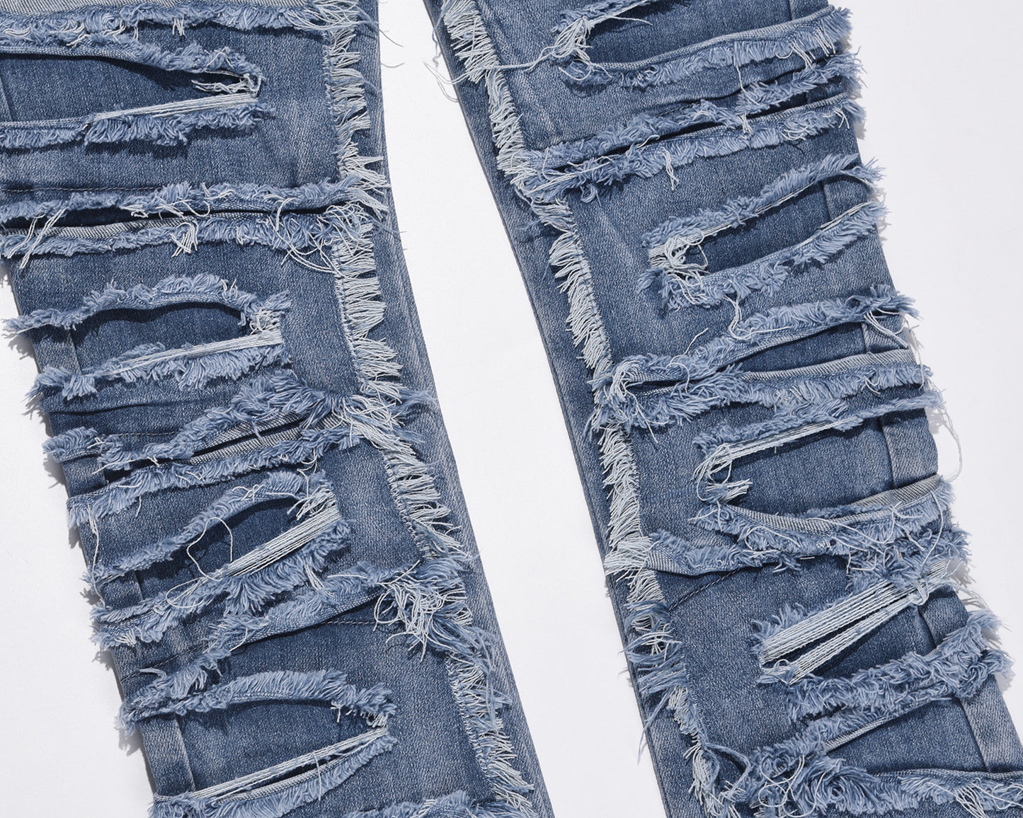 Ripped Patch Whisker Blue Jeans